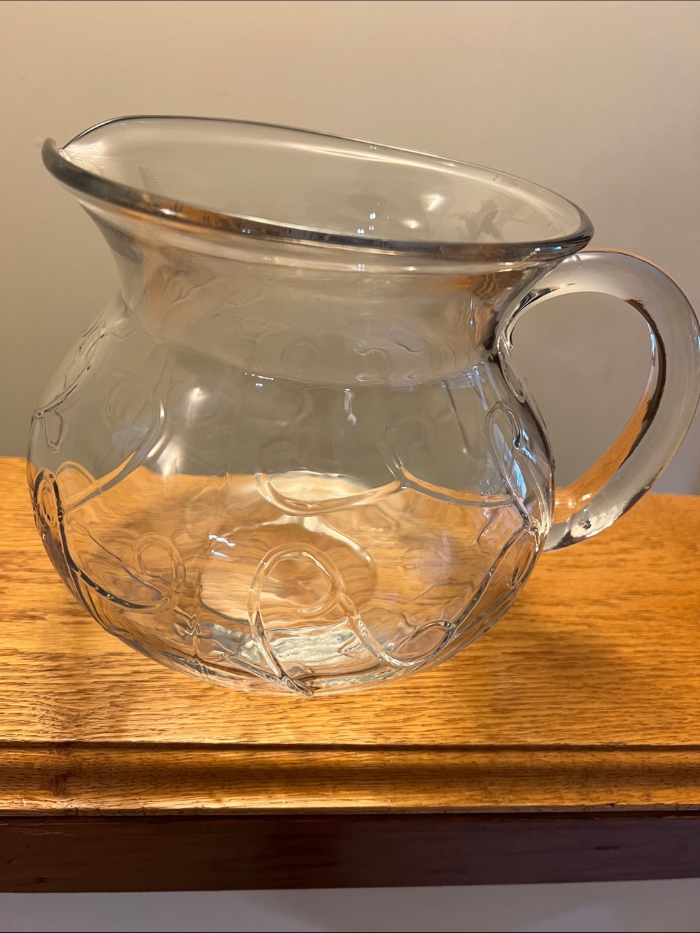 Southern Living Clear Glass Pitcher with handle.